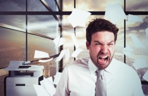 39808311 - businessman stressed and overworked yelling in office